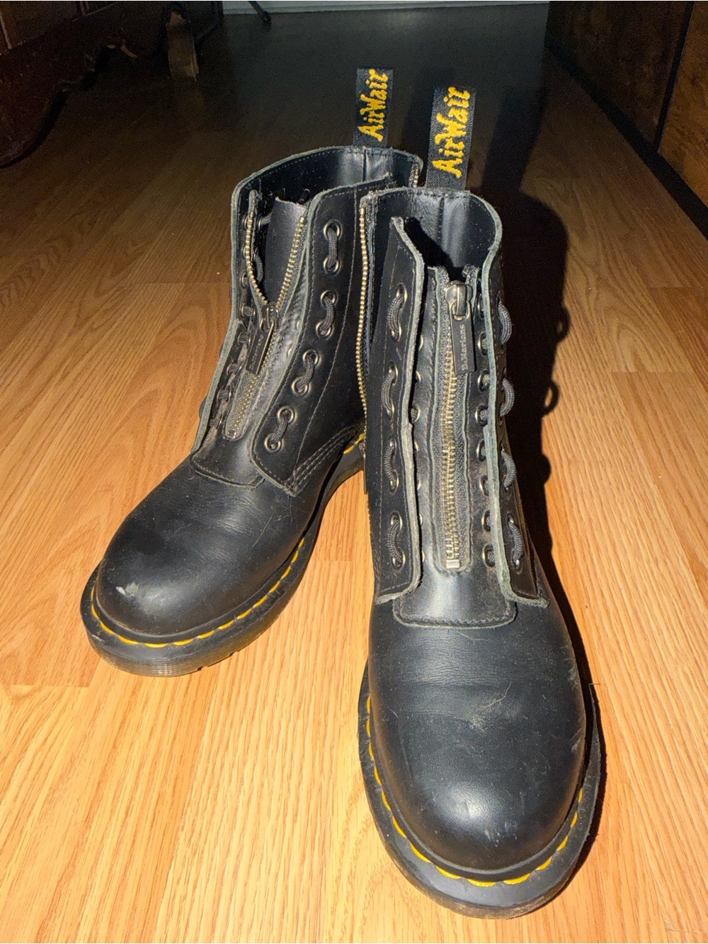 Dr. Martens Black Leather Front-Zip Ankle Boots with Yellow Stitching